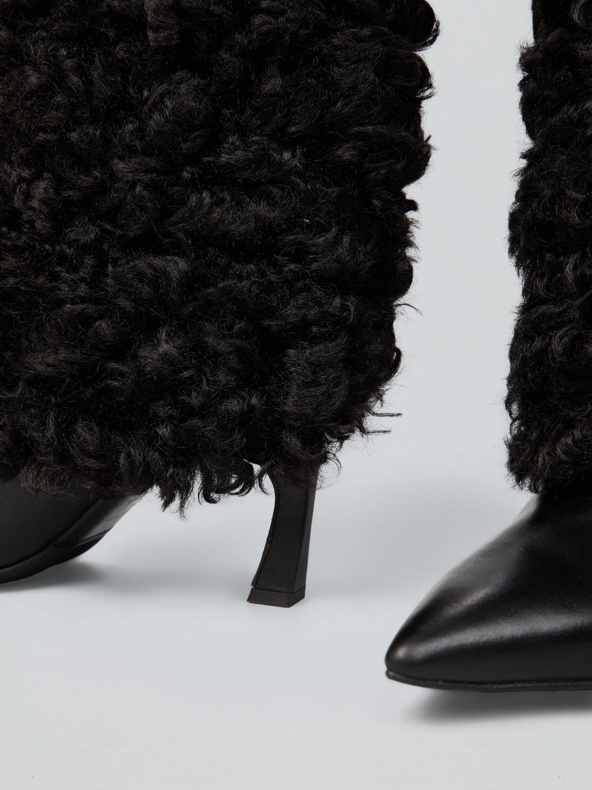 Leather boots with faux fur