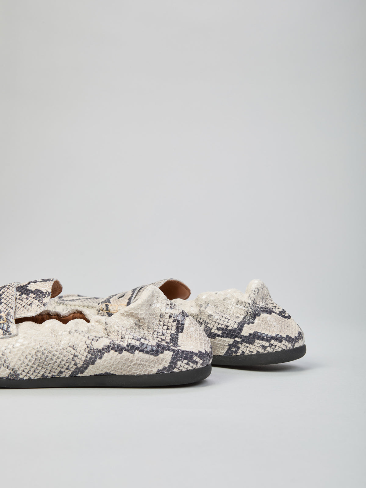 Python print leather loafers
