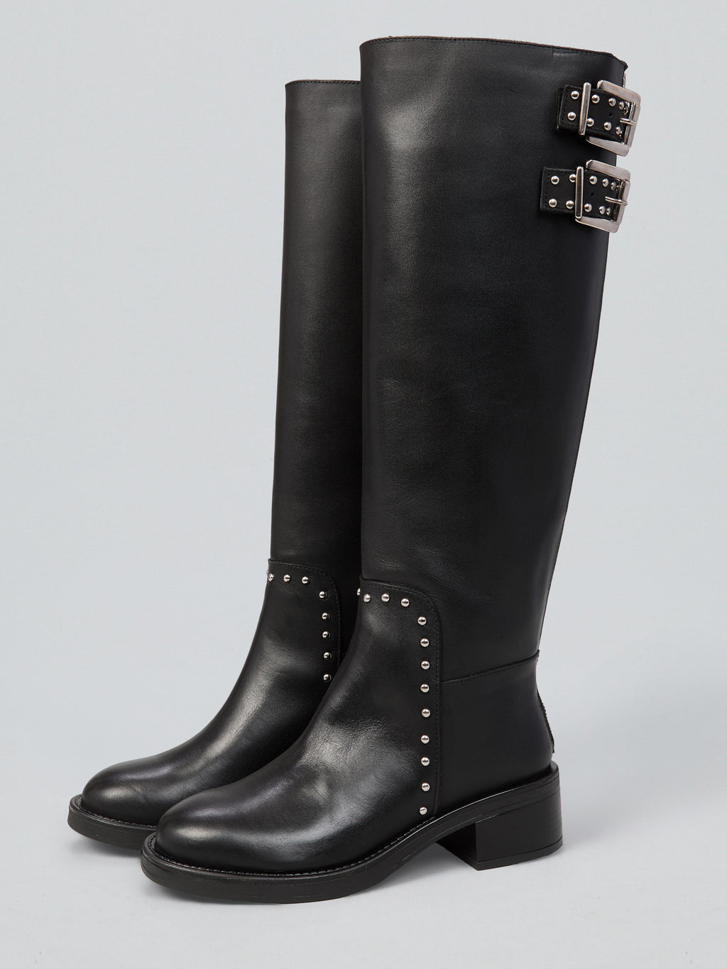 Leather boots with studs and buckles