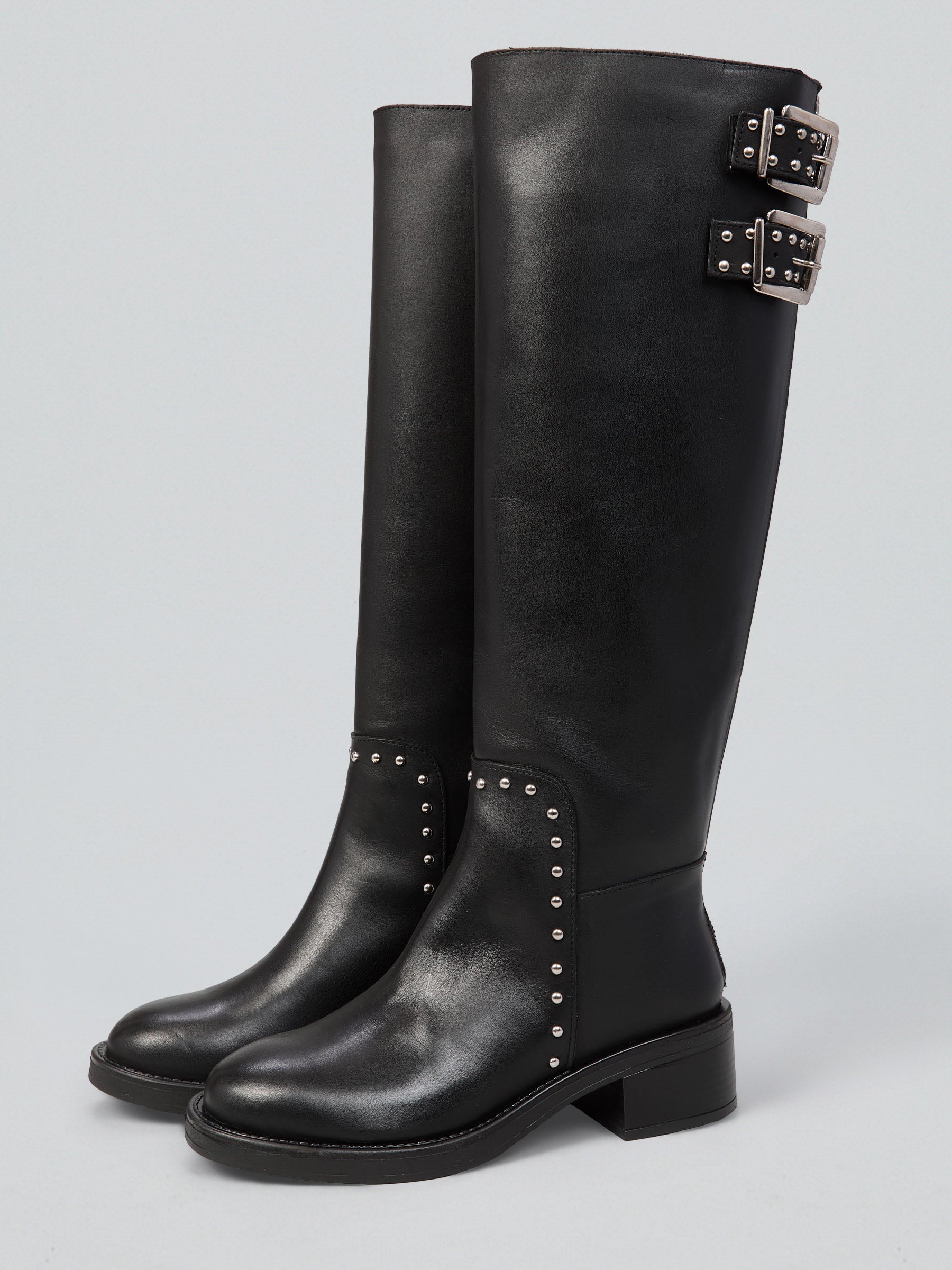 Leather boots with studs and buckles