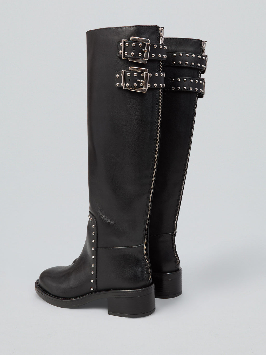 Leather boots with studs and buckles