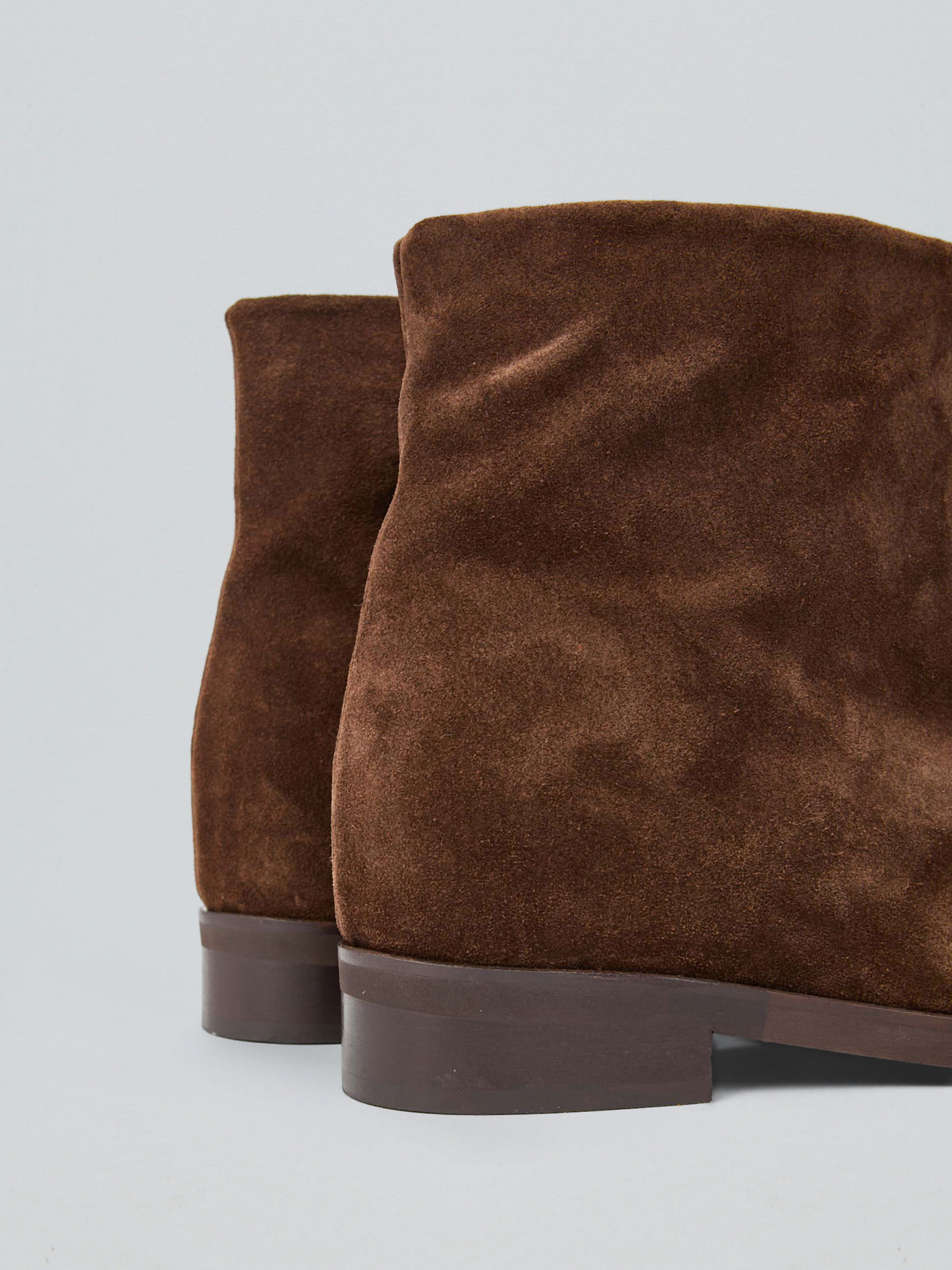 Suede ankle boot with internal wedge