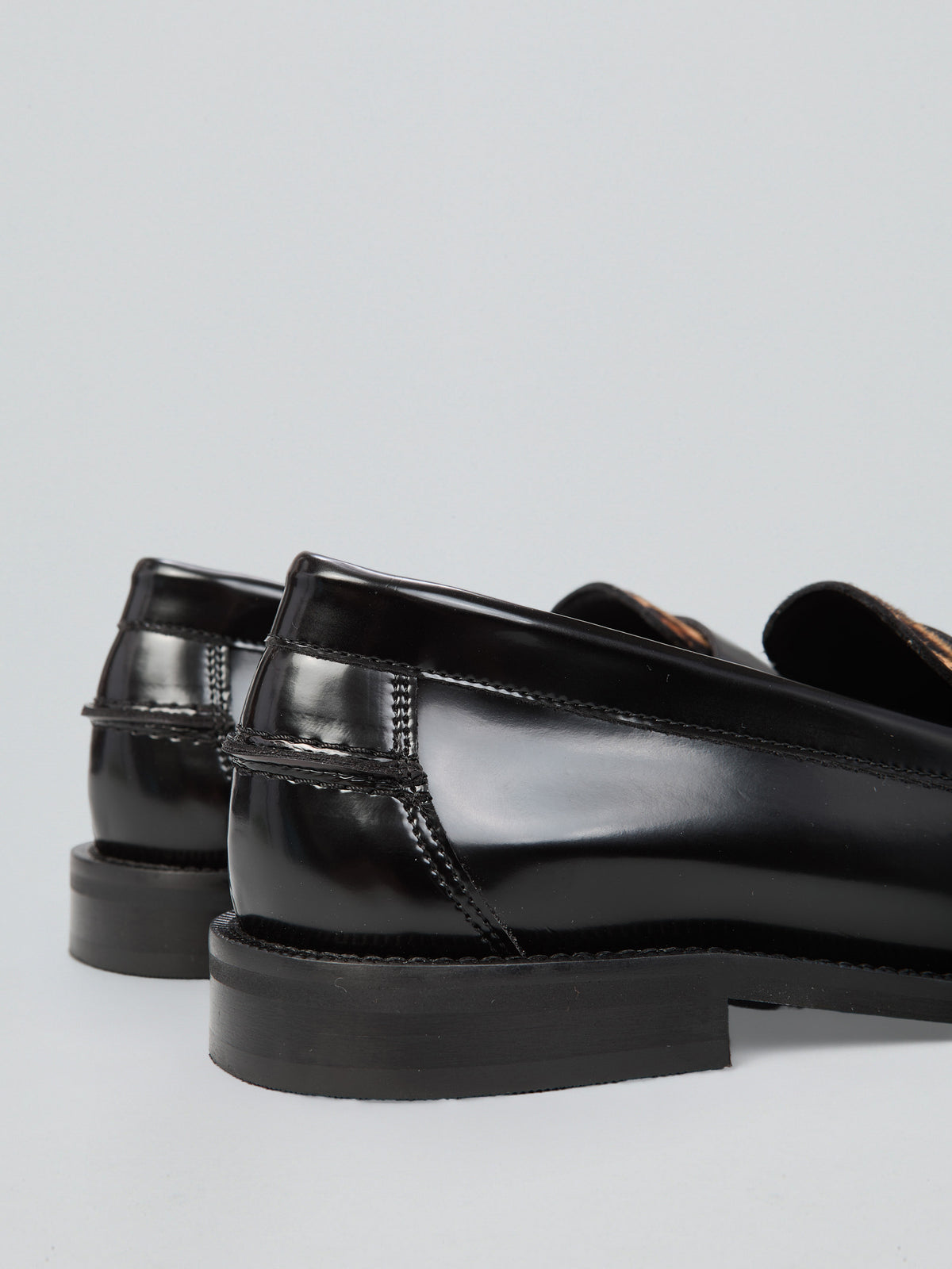 Classic loafers with leopard print pony hair insert