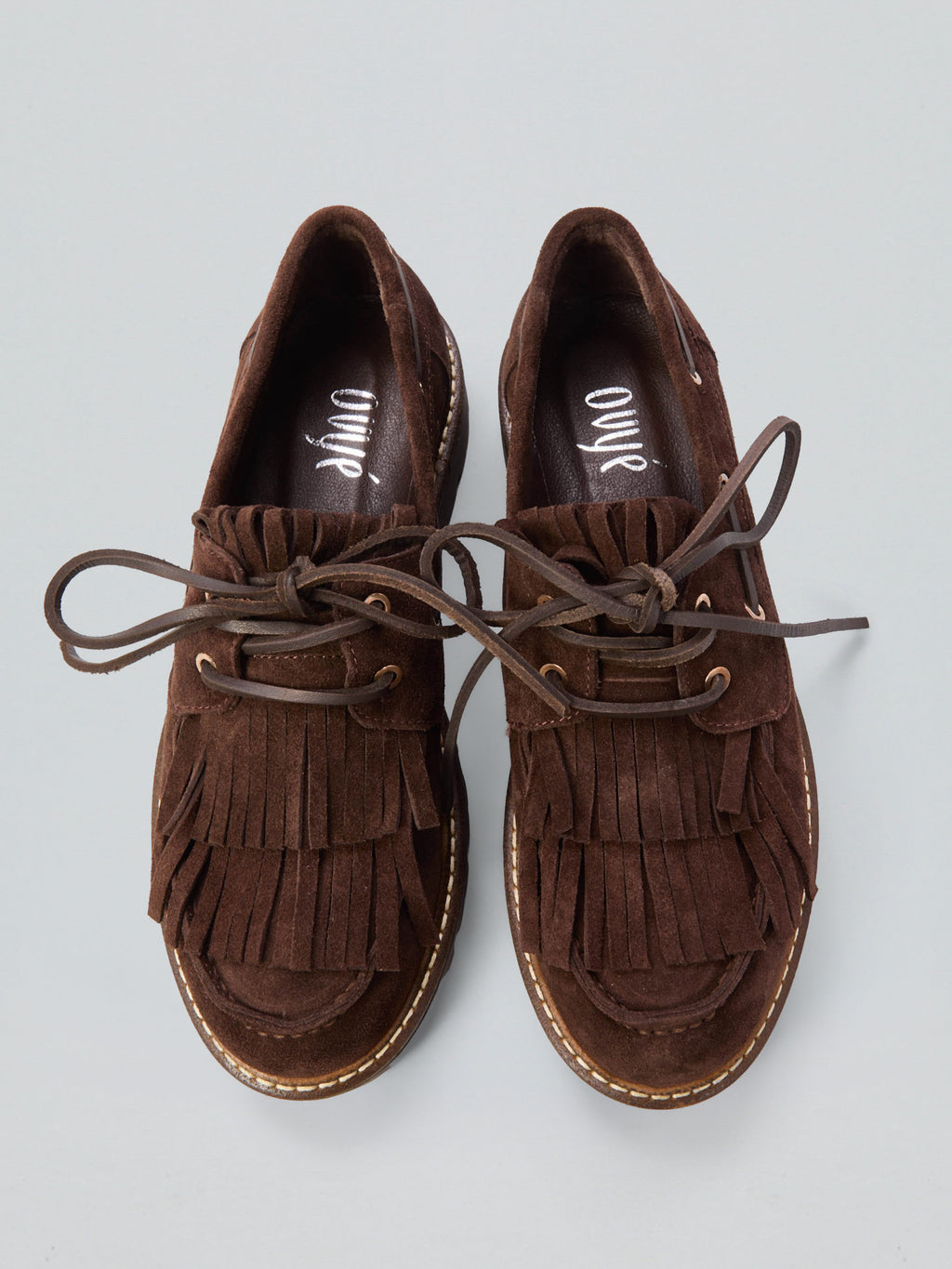 Suede fringed lace-up loafers