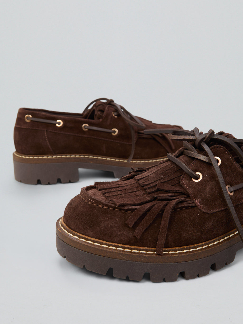Suede fringed lace-up loafers