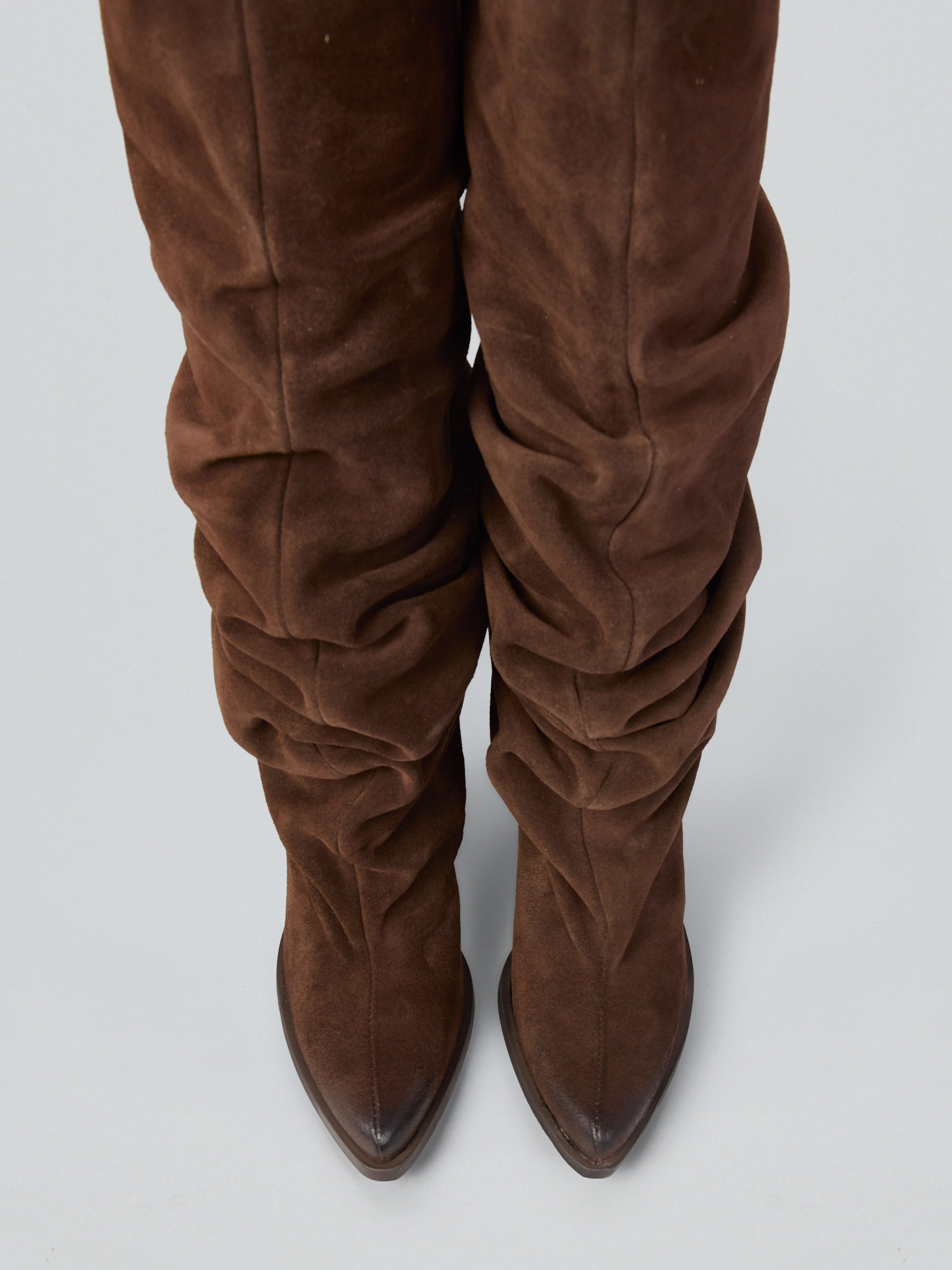 Fringed suede cowboy boots