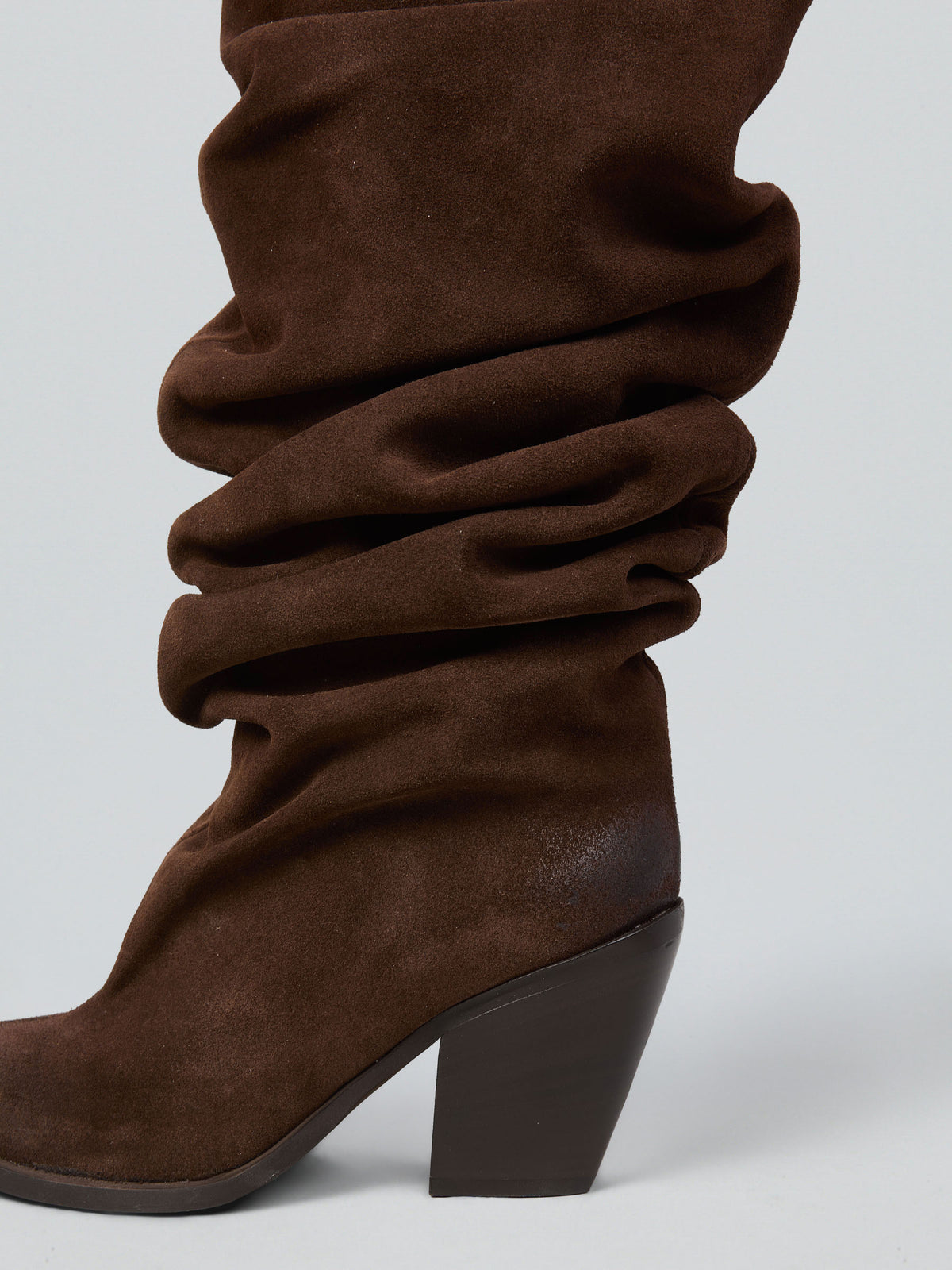 Fringed suede cowboy boots